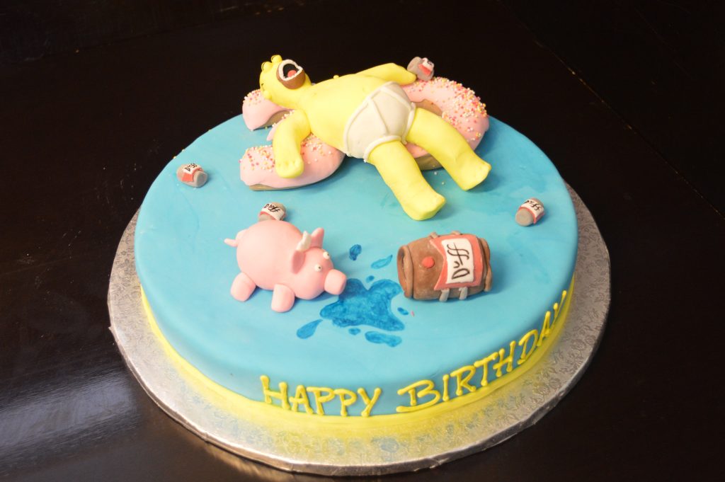 Homer-Simpson-Torte – Geburtstagstorte mit Donuts und Bierdosen von Konditorei & Café Krüsmann Leipzig